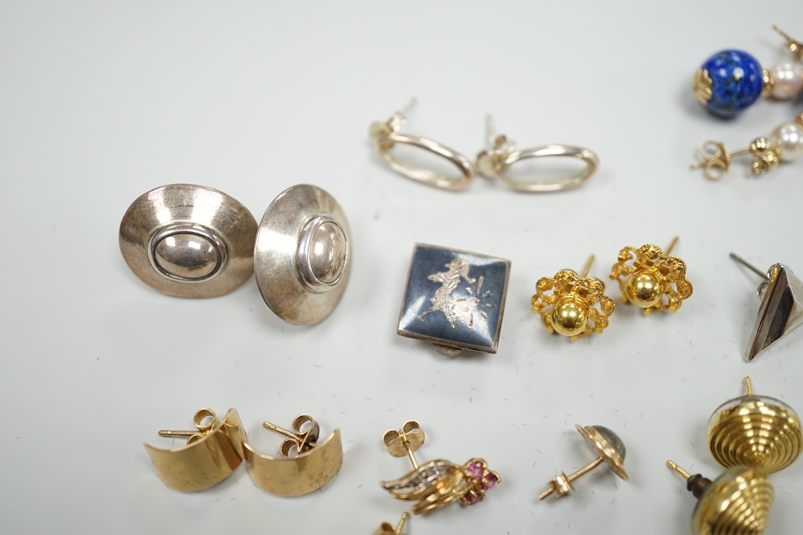 A modern pair of 9ct gold, gold, ruby and diamond earrings, boxed and nine other assorted pairs of earrings and two odd earrings.